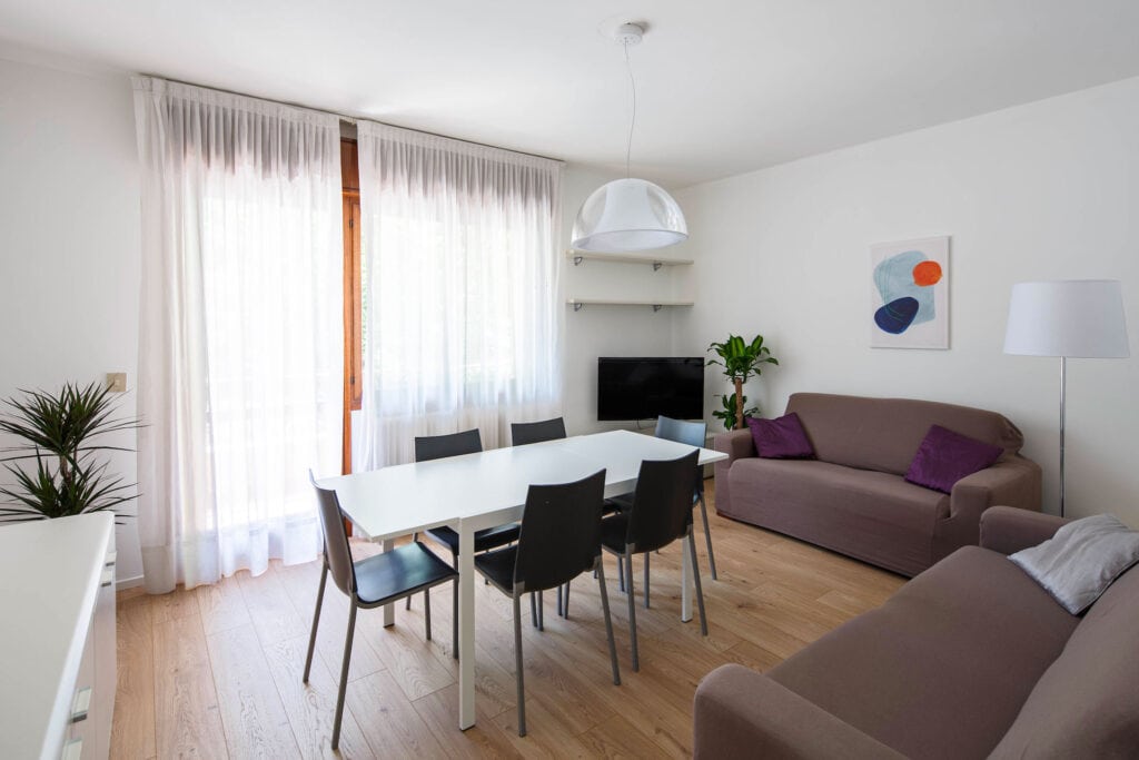 Lightful living room with balcony - Calmo SX 1 Levi Apartment